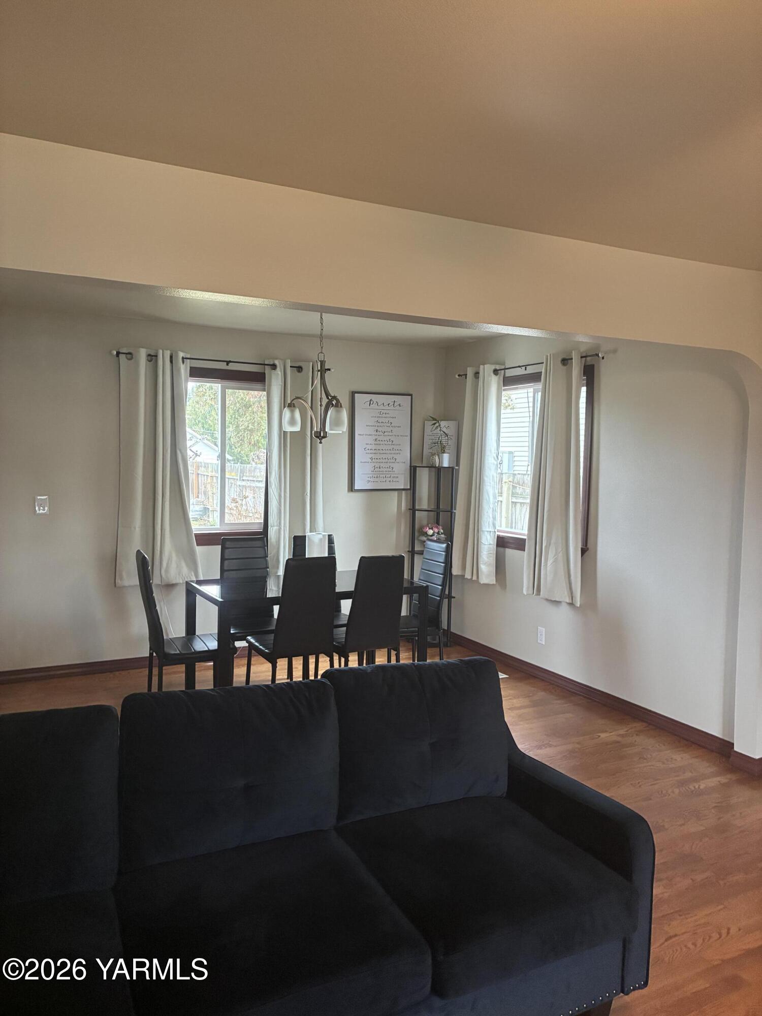 303 Ave G Grandview, WA 98930 - Photo 3 of 23 a view of a room with furniture and wooden floor