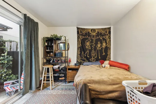 a kitchen with stainless steel appliances a refrigerator sink and cabinets