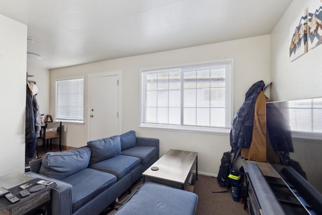 a bedroom with a bed and furniture