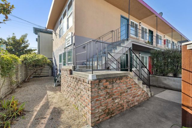 a view of pathway along with yard