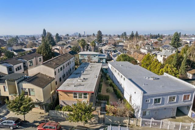 an aerial view of a city with lots of residential buildings