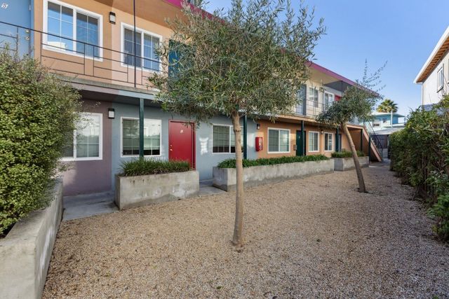 front view of a house with a street