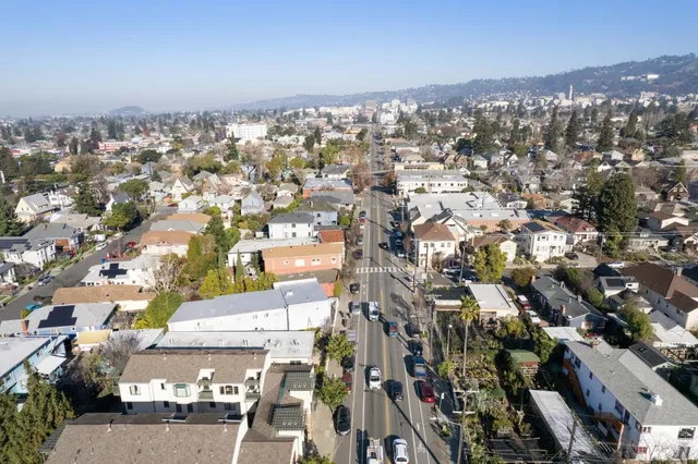an aerial view of a city with lots of residential buildings