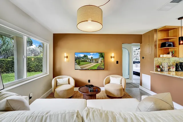 a bedroom with a bed and ceiling fan