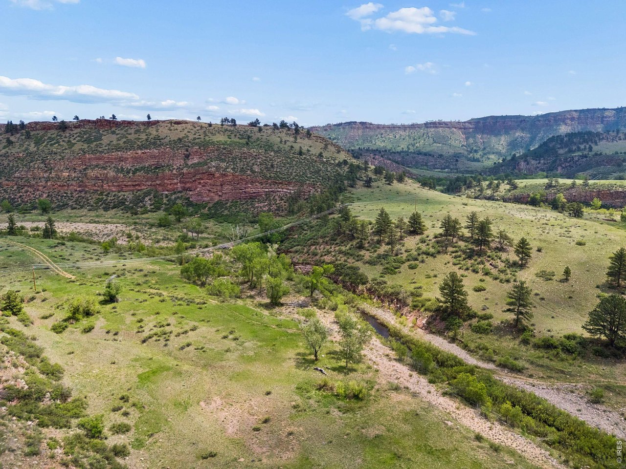 1115 Vision Way Lyons, CO 80540 - Photo 4 of 32 The river winding past the cliffs