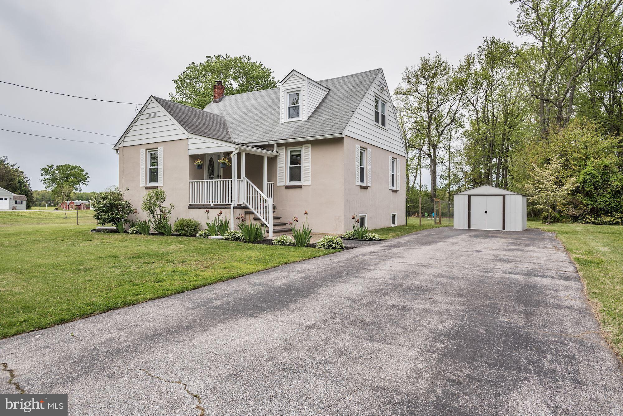 110 North Dupont Road Carneys Point, NJ 08069 - Photo 29 of 34 Covered Porch, Large driveway & Shed