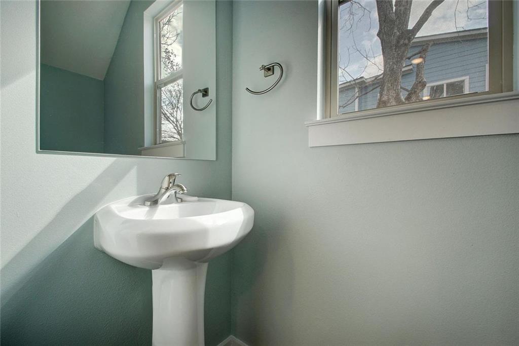 1608 Miriam Avenue, Unit B Austin, TX 78702 - Photo 4 of 10 Bathroom featuring vaulted ceiling