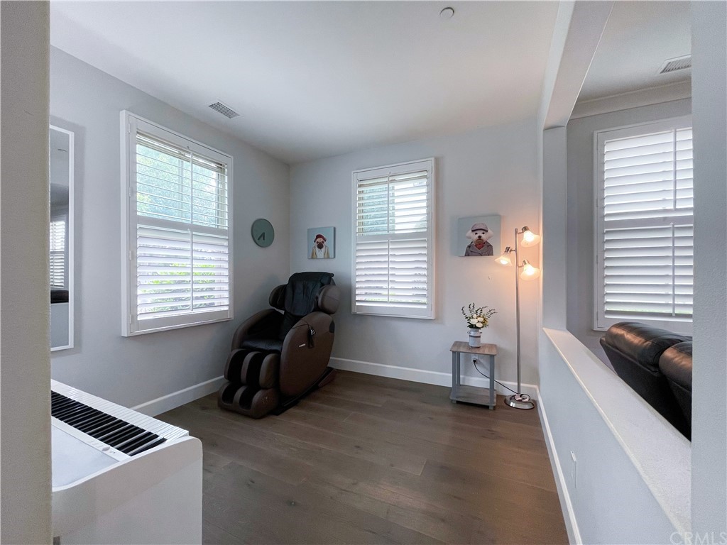 35 Courant Irvine, CA 92618 - Photo 6 of 21 a living room with furniture and a window