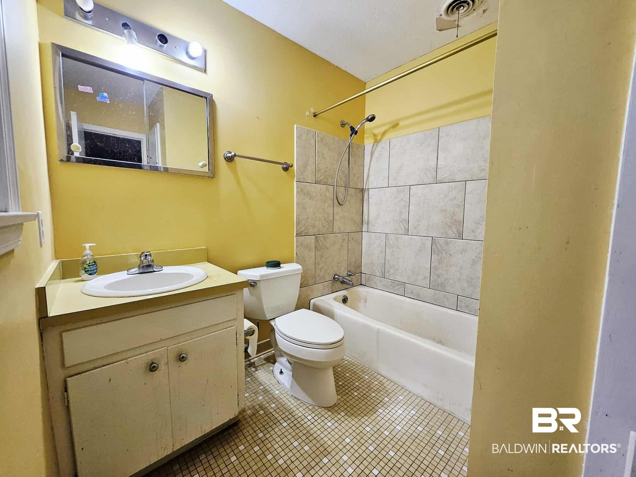 324 Vanderbilt Drive Mobile, AL 36608 - Photo 13 of 17 Full bathroom featuring bathtub / shower combination, vanity, and tile patterned flooring