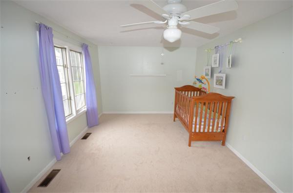 12 Perley Road, Unit 23D Derry, NH 03038 - Photo 15 of 20 wooden floor in an empty room with a window