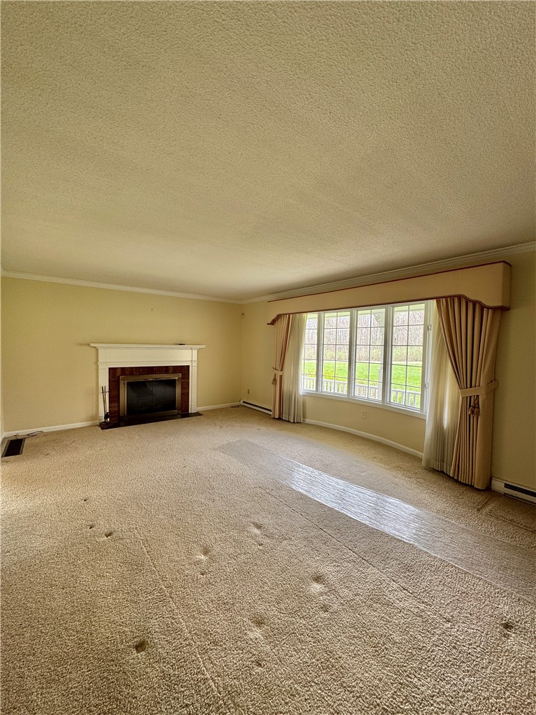 84 Oak Hill Road Horseheads, NY 14845 - Photo 15 of 48 Large living room with fireplace and bay window