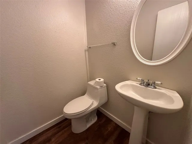 a kitchen with a stove and a microwave