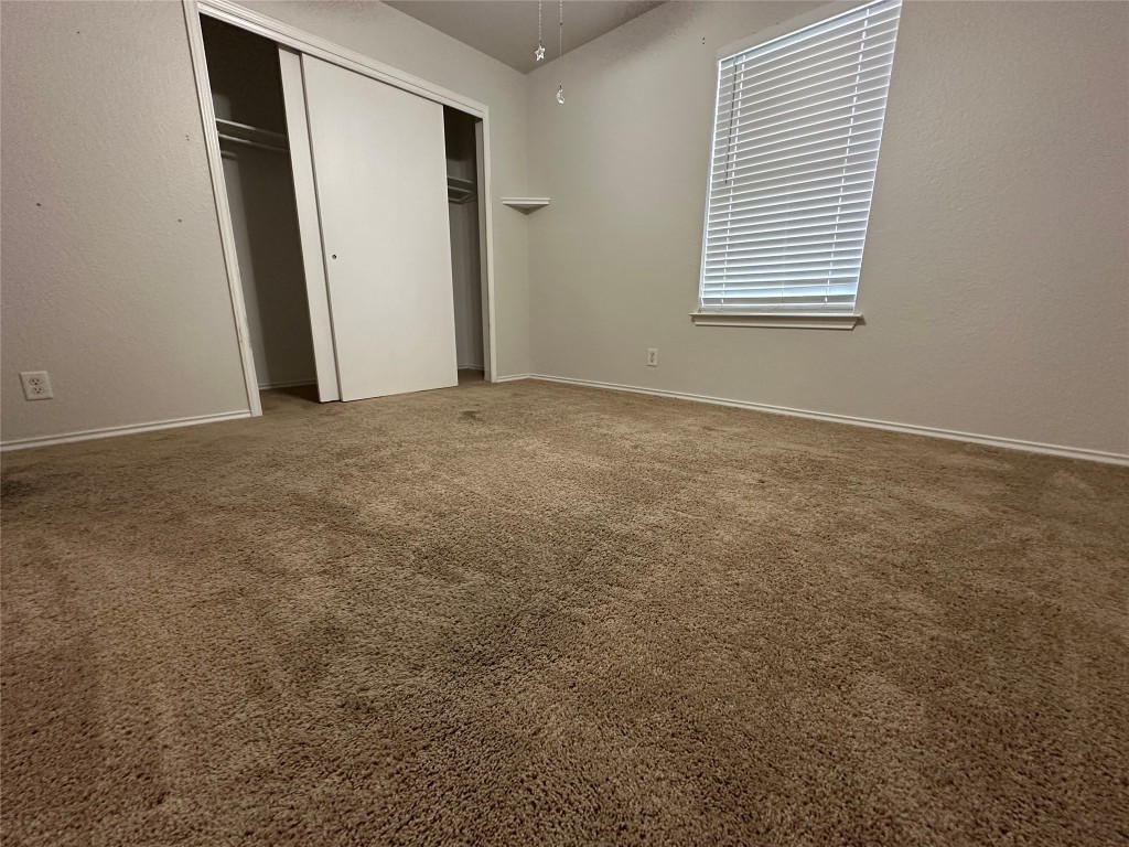 113 Lex Word Kyle, TX 78640 - Photo 22 of 40 an empty room with windows