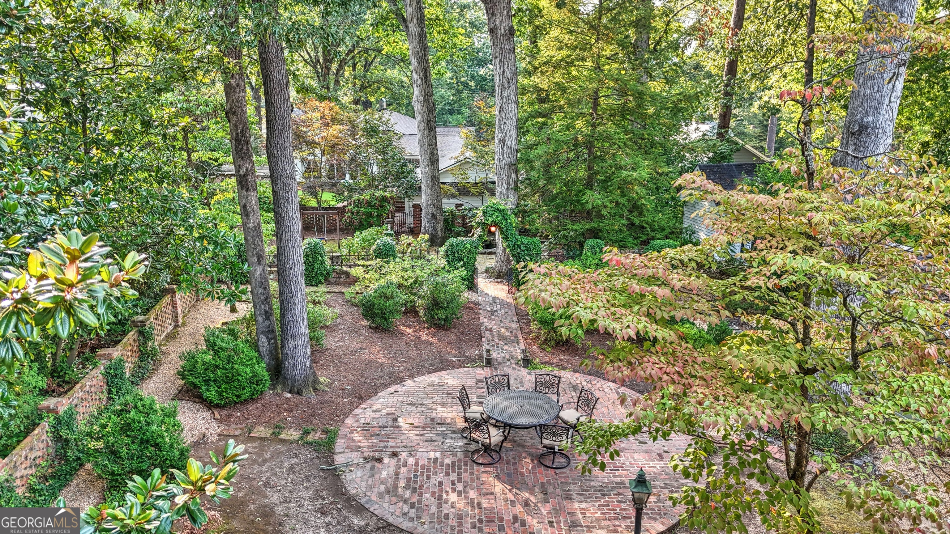 209 Sherwood Road Southwest Rome, GA 30165 - Photo 2 of 71 a view of a garden with large trees