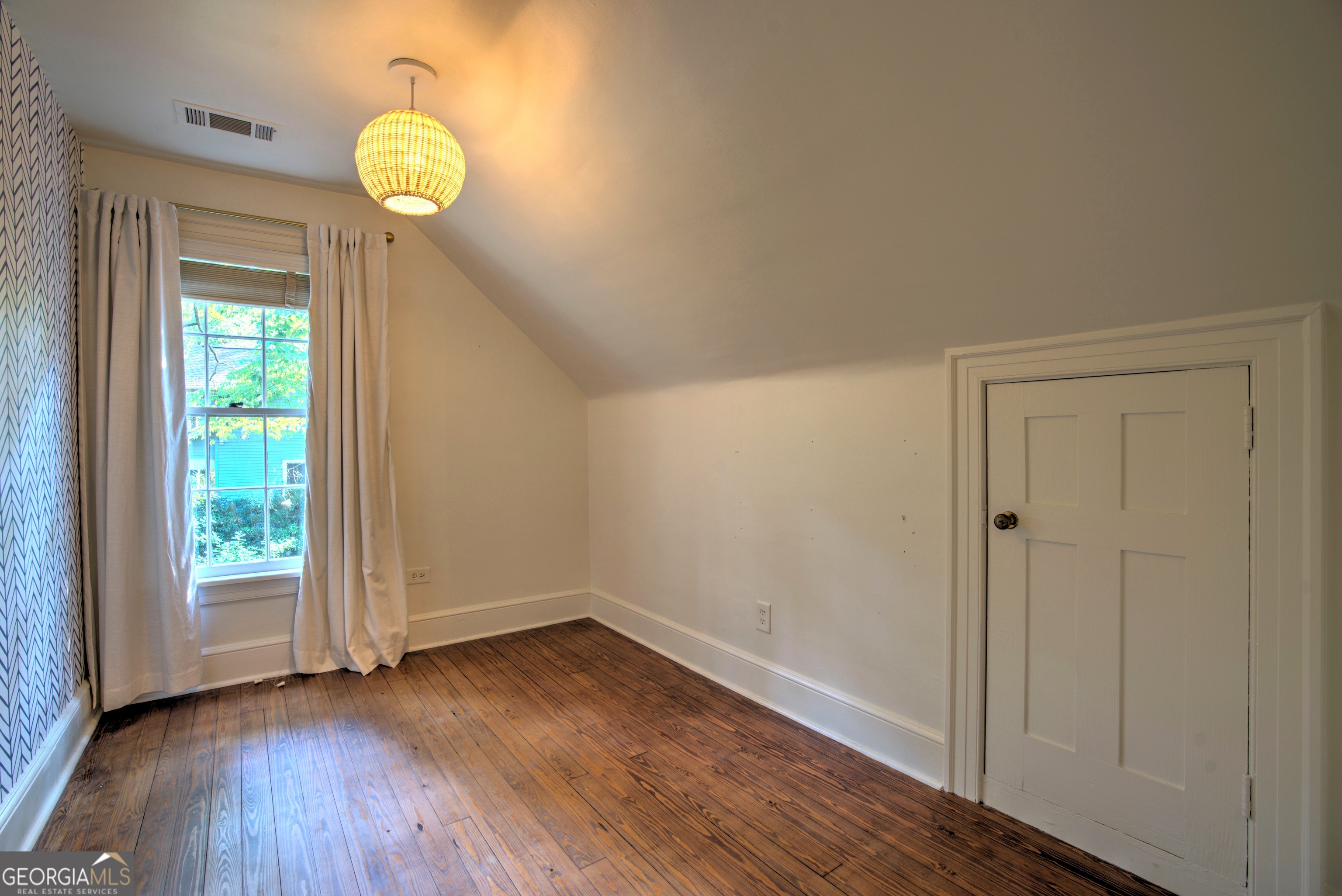 209 Sherwood Road Southwest Rome, GA 30165 - Photo 45 of 71 a view of a room that has wooden floor and windows