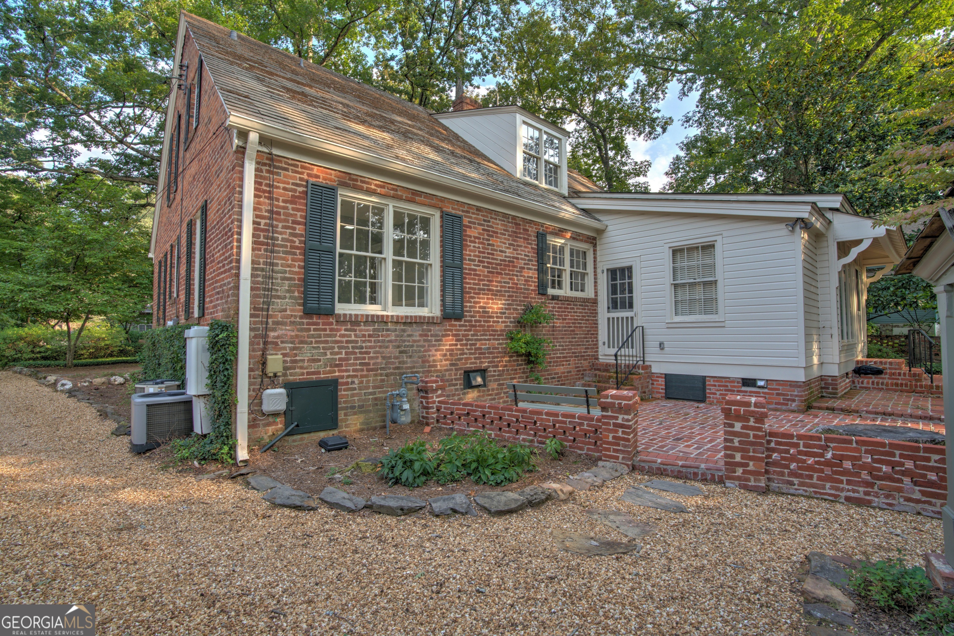 209 Sherwood Road Southwest Rome, GA 30165 - Photo 57 of 71 a front view of a house with garden