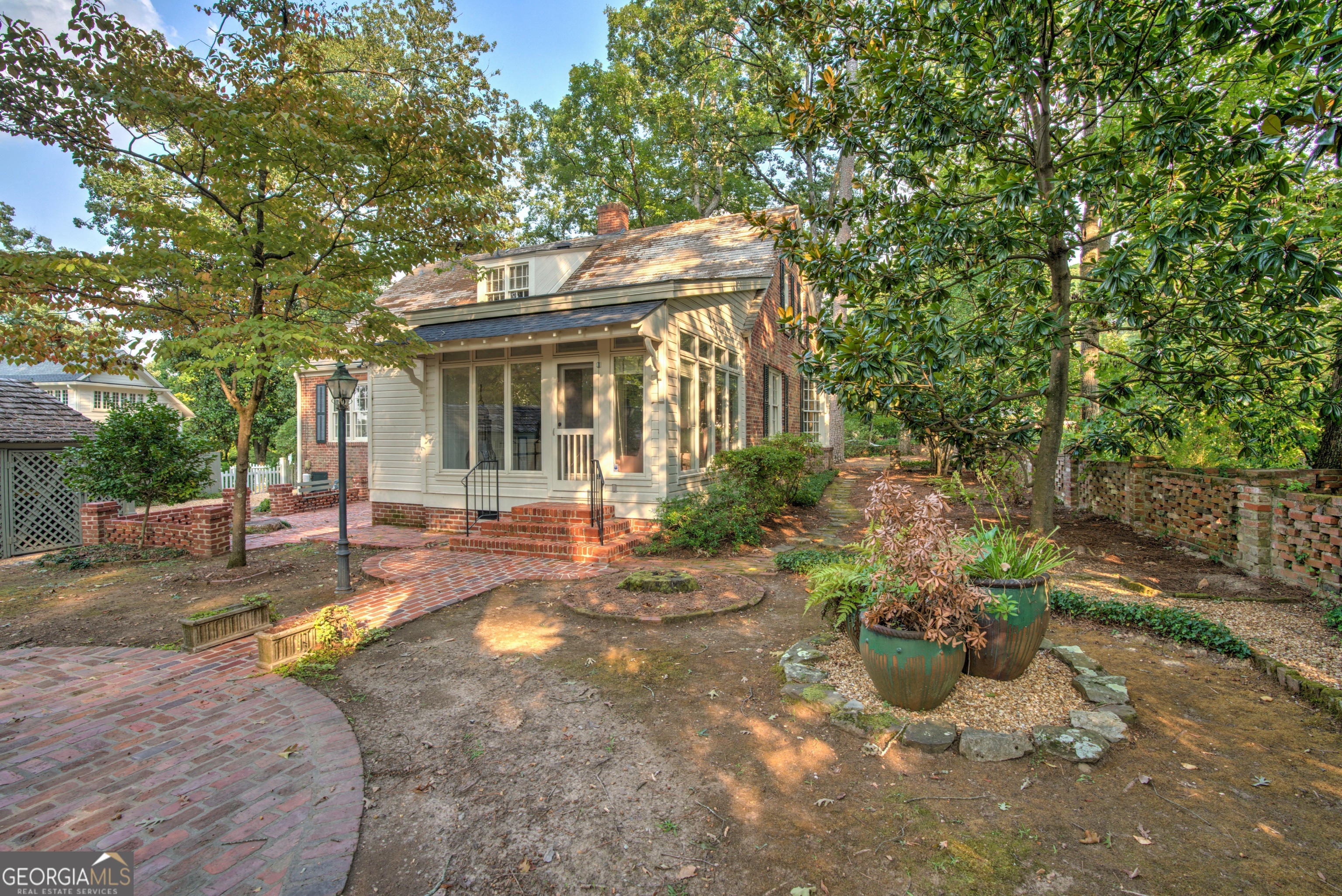 209 Sherwood Road Southwest Rome, GA 30165 - Photo 60 of 71 a view of a house with backyard and sitting area