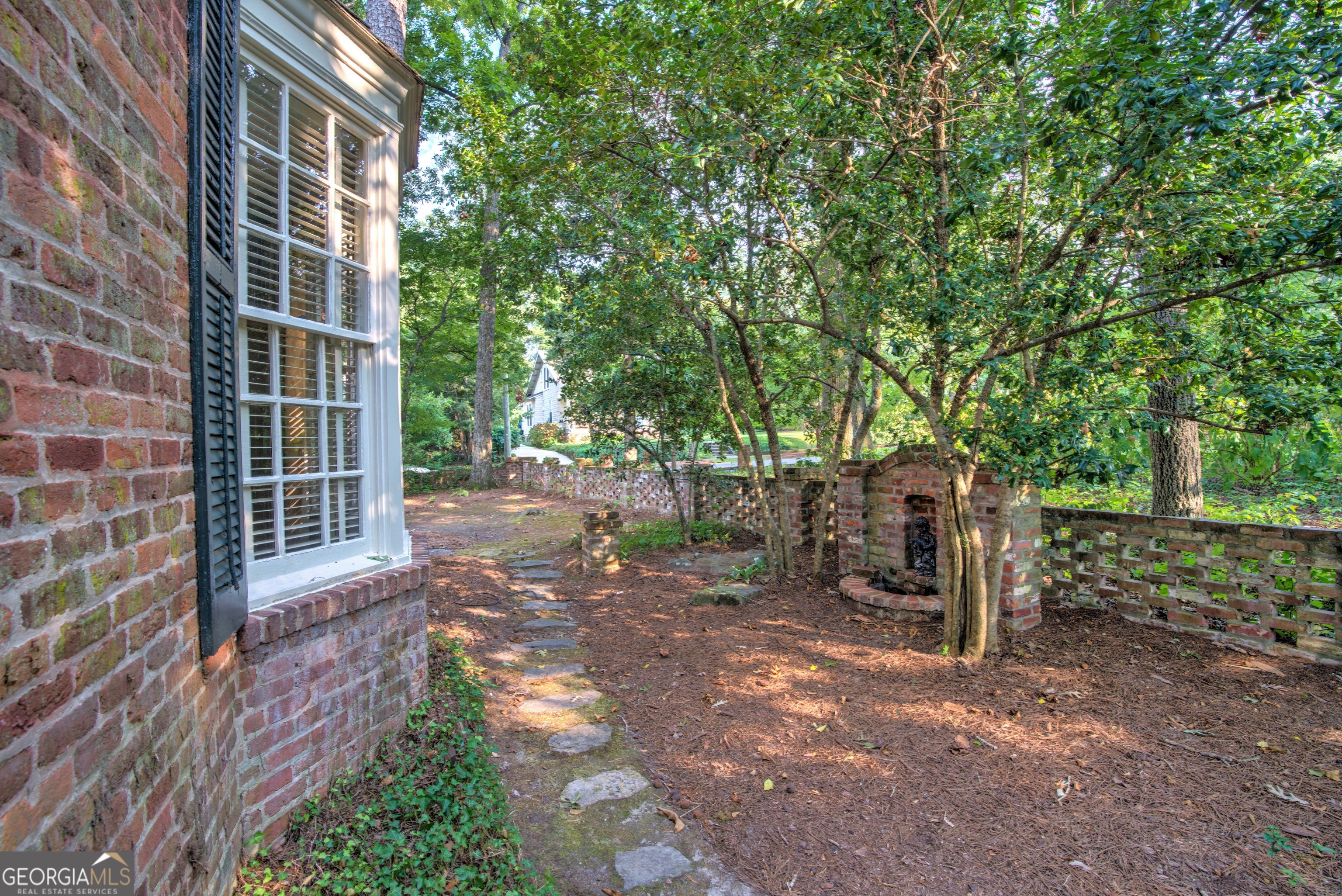 209 Sherwood Road Southwest Rome, GA 30165 - Photo 61 of 71 a view of a house with backyard and sitting area