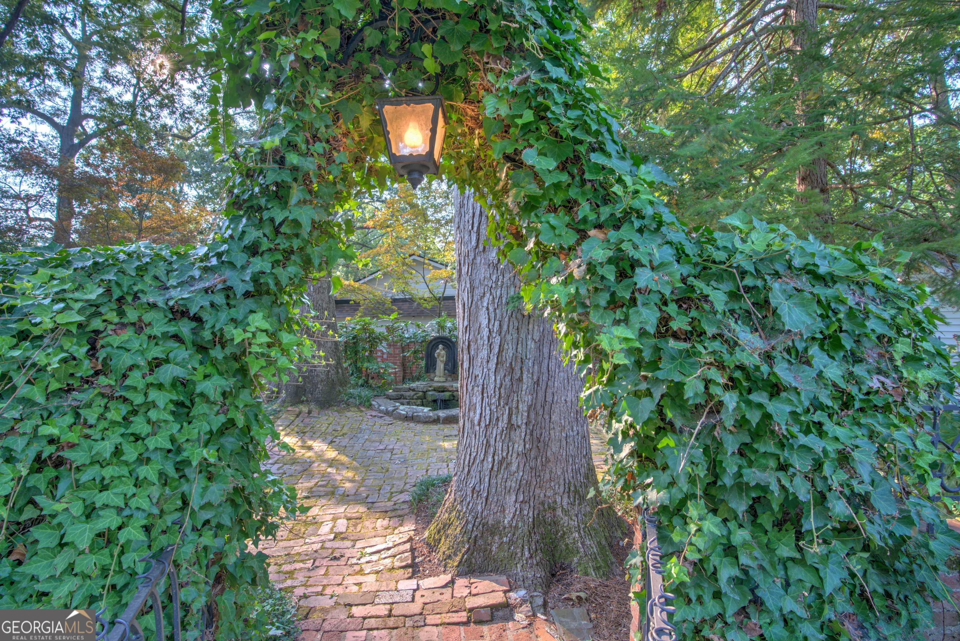 209 Sherwood Road Southwest Rome, GA 30165 - Photo 66 of 71 a view of a garden with a tree