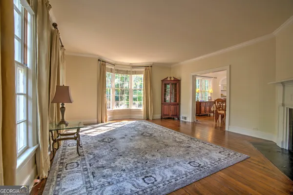 a room with furniture and a flat screen tv