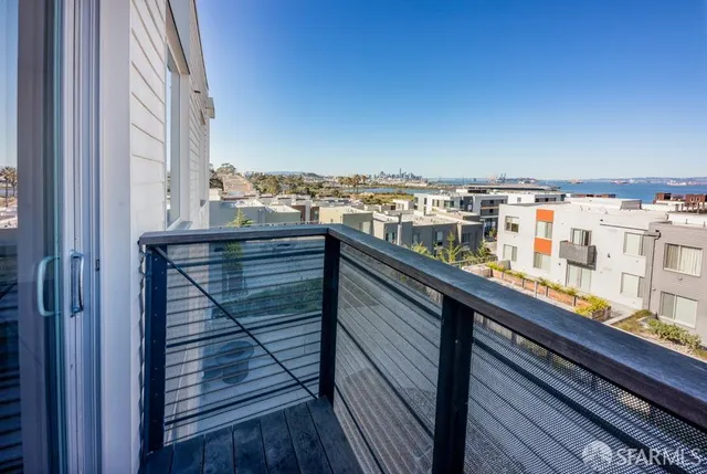a view of a balcony with city view