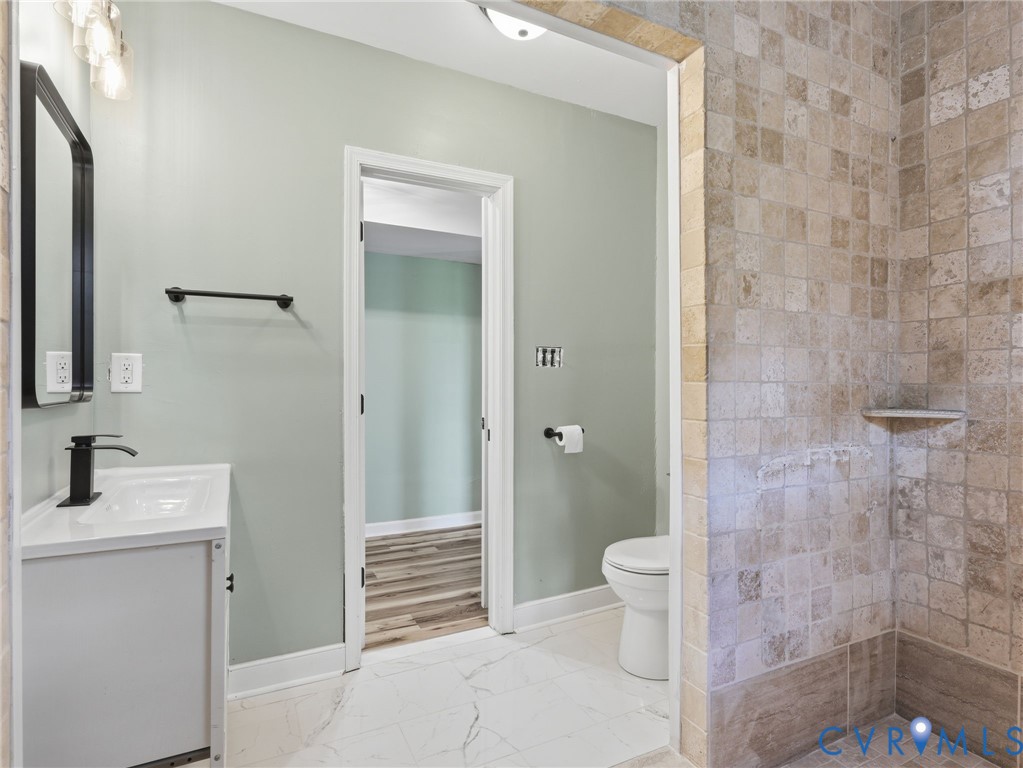 614 Cedar Level Road Hopewell, VA 23860 - Photo 22 of 39 En-suite bathroom to one of the first floor primar