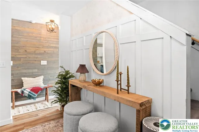 a bathroom with a toilet a sink and a mirror