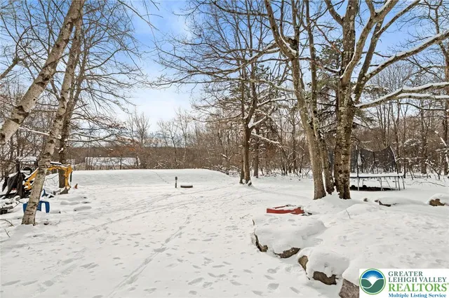 a view of snow on the road