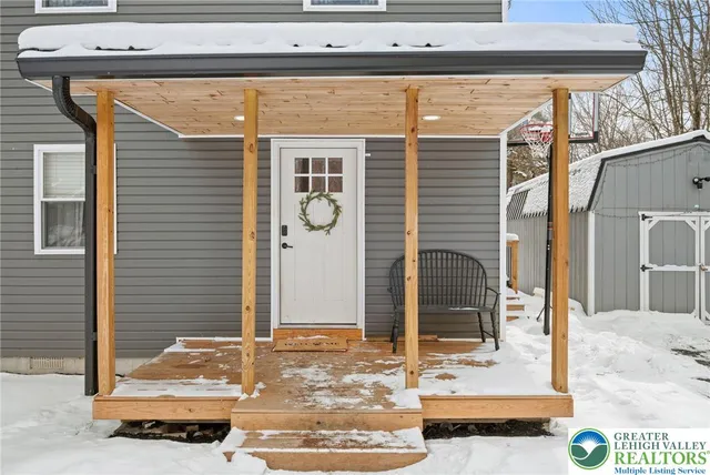 a view of a entryway door front of house