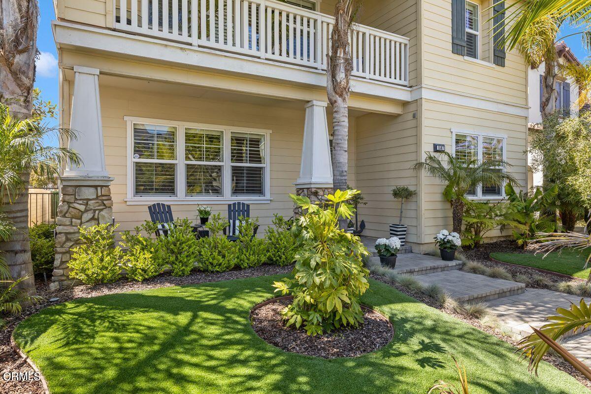 1507 Seabridge Lane Oxnard, CA 93035 - Photo 1 of 2 a front view of a house with a yard