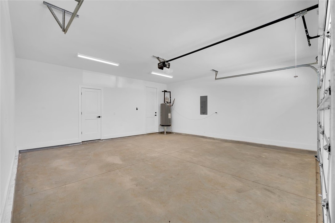 407 Blue Ridge Court Westminster, SC 29693 - Photo 28 of 48 This spacious garage offers ample room and direct interior access.
