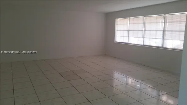 an empty room with closet