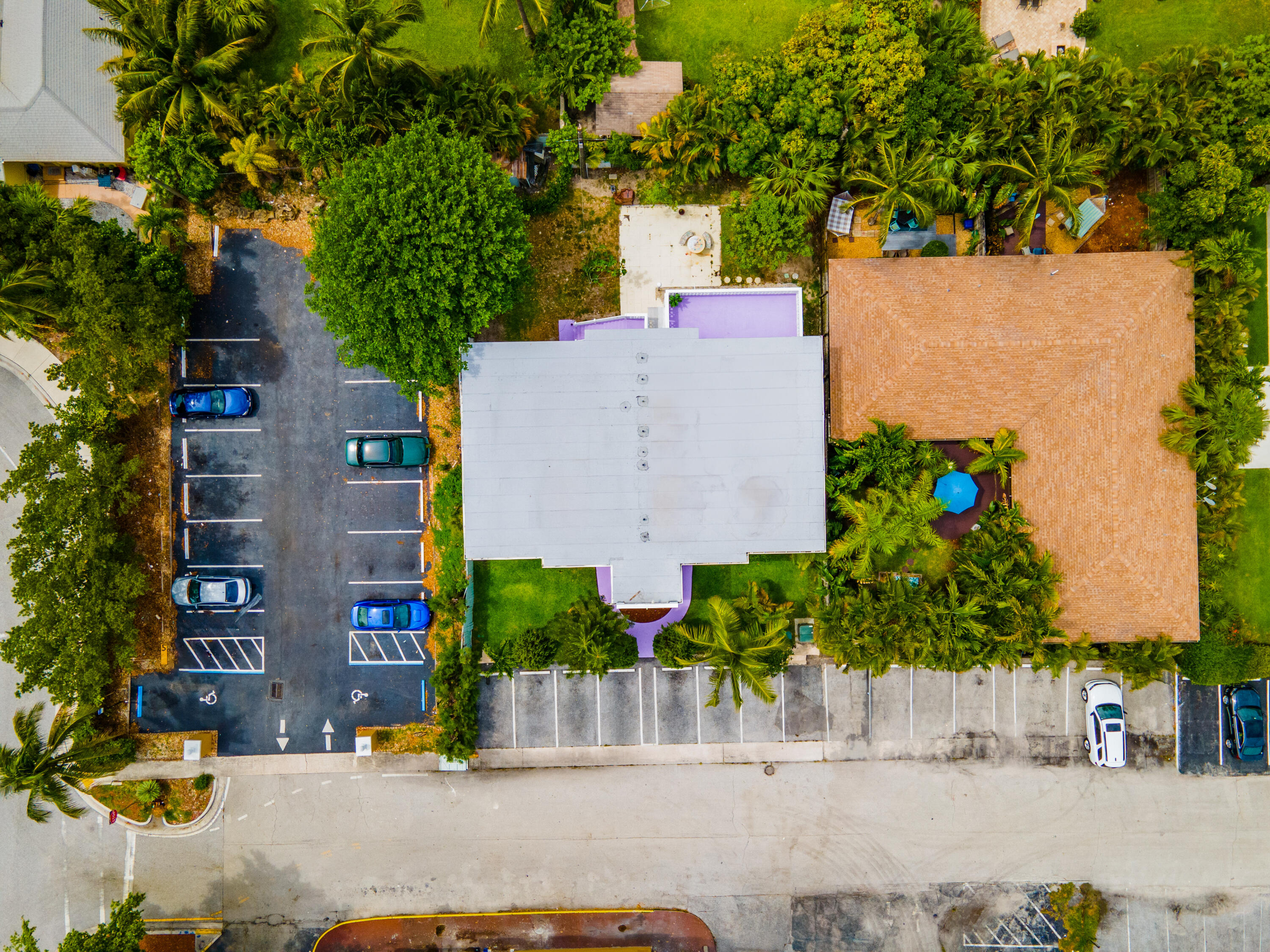 1279 Beach Road, Unit 3 Singer Island, FL 33404 - Photo 23 of 23 an aerial view of a house with a yard and large tree