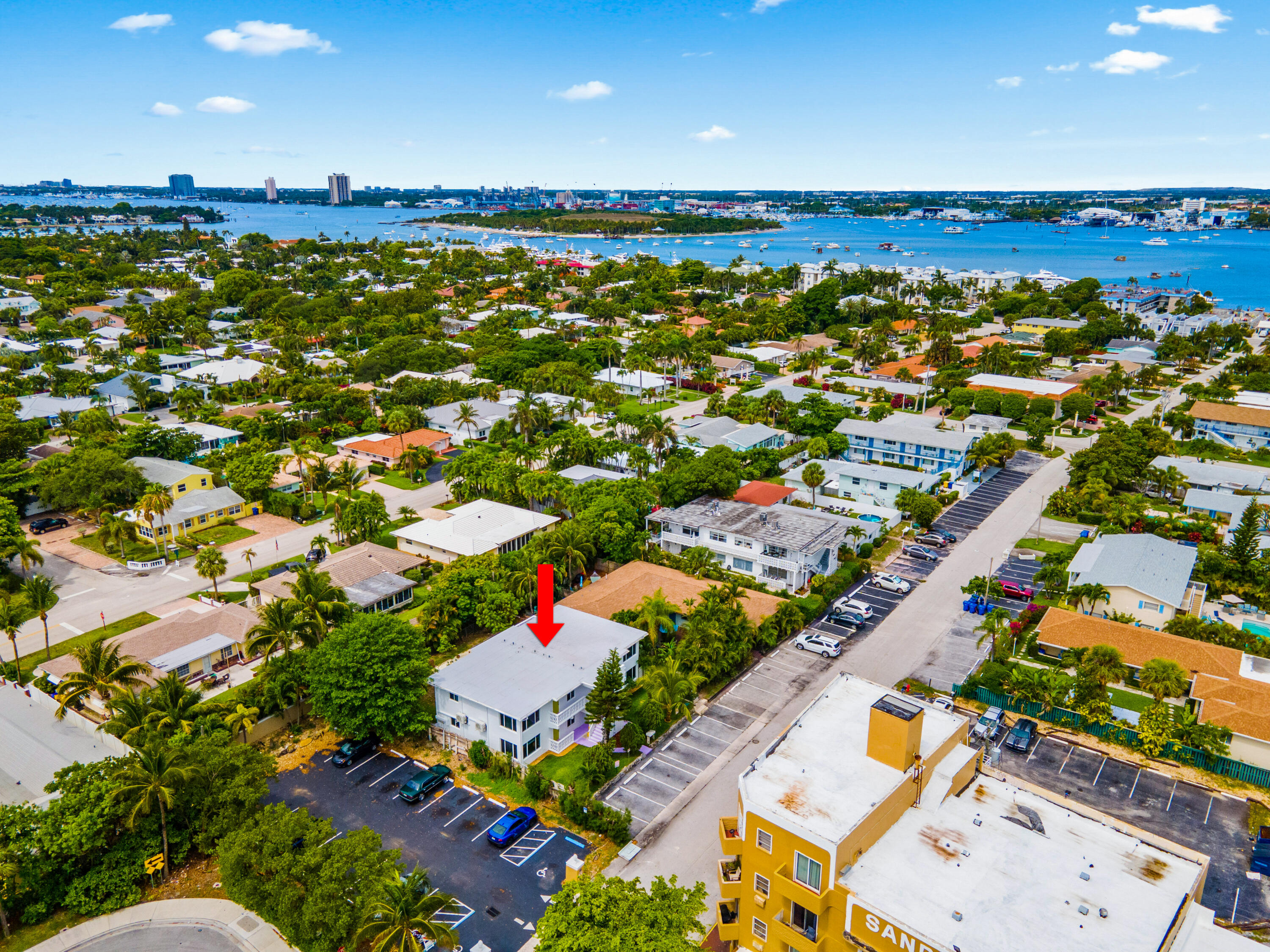 1279 Beach Road, Unit 3 Singer Island, FL 33404 - Photo 3 of 23 an aerial view of residential houses with outdoor space