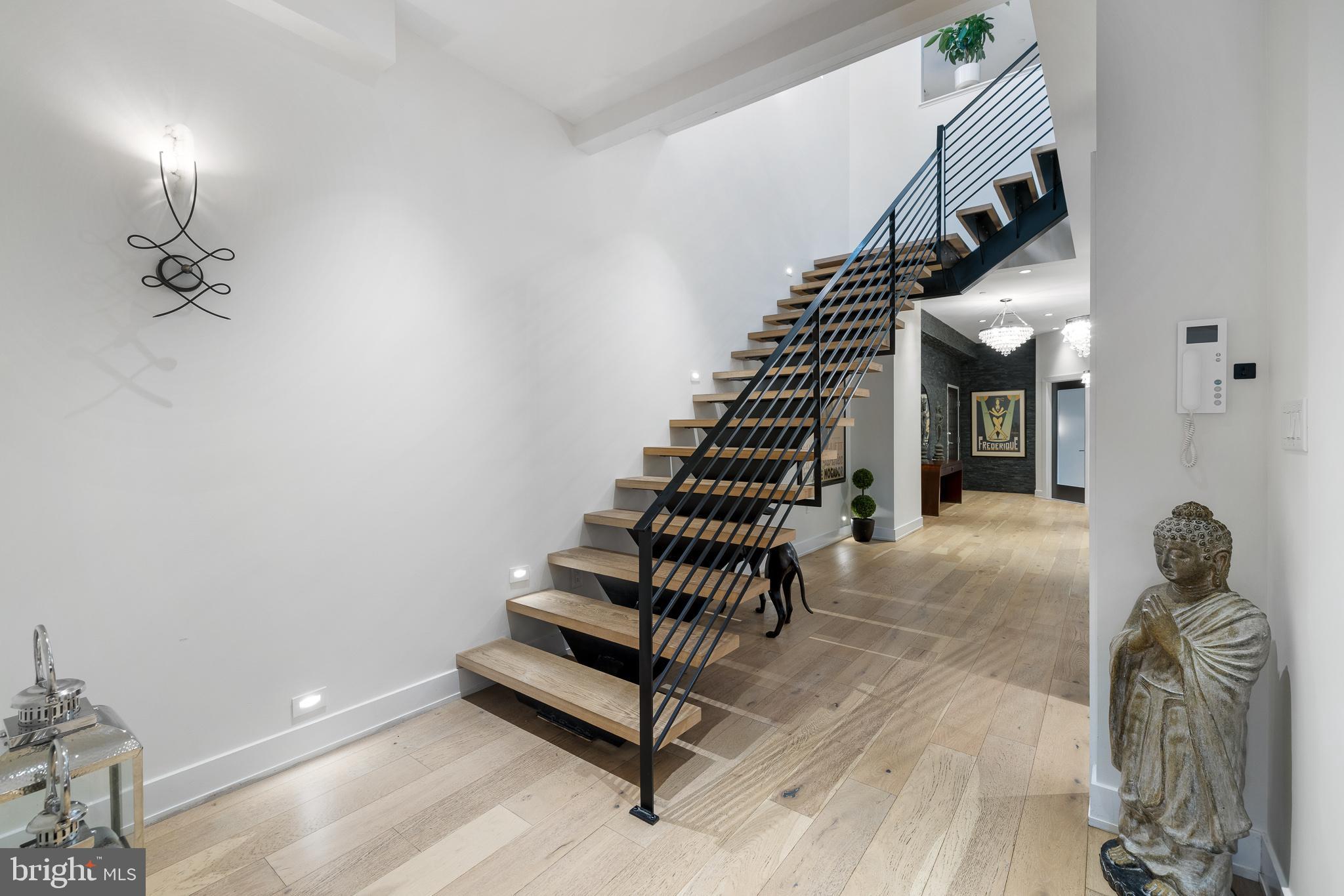 20 Letitia Street, Unit 5B Philadelphia, PA 19106 - Photo 14 of 44 a view of entryway and hall with wooden floor