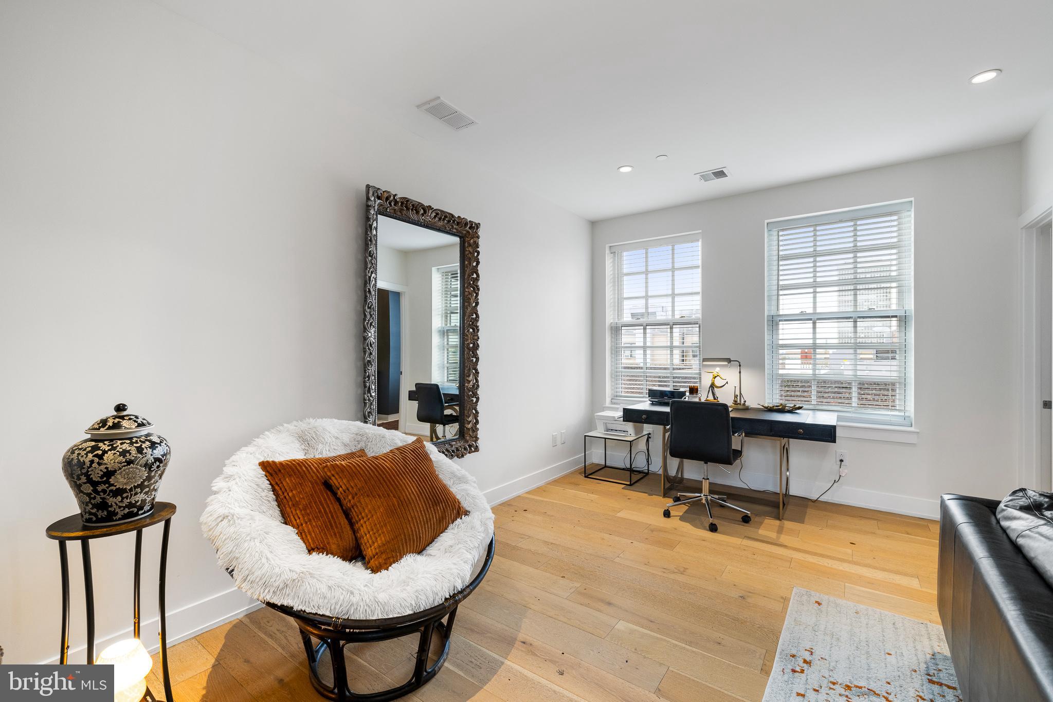 20 Letitia Street, Unit 5B Philadelphia, PA 19106 - Photo 19 of 44 a living room with furniture and a window