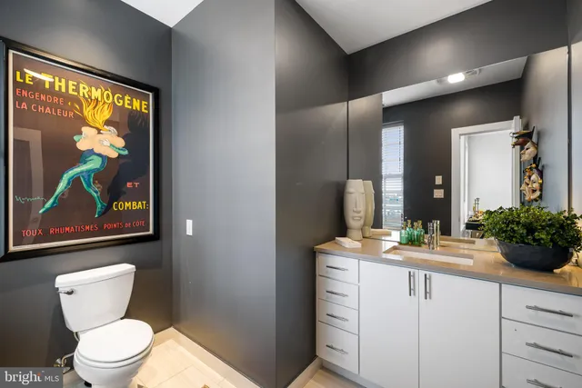 a bedroom with a balcony large bed and furniture