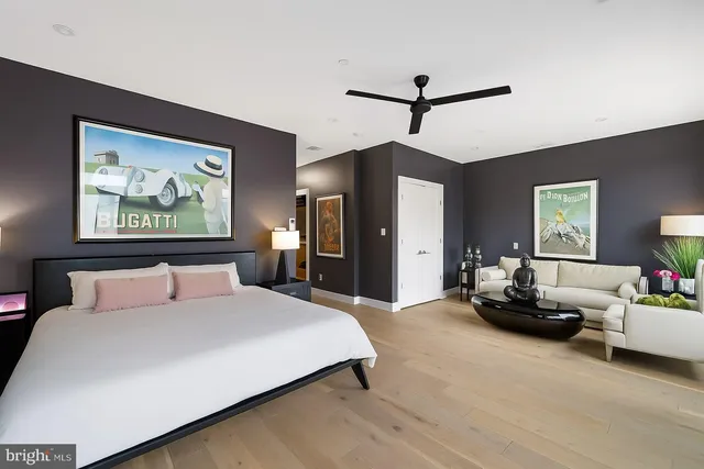 a bedroom with a bed and dresser