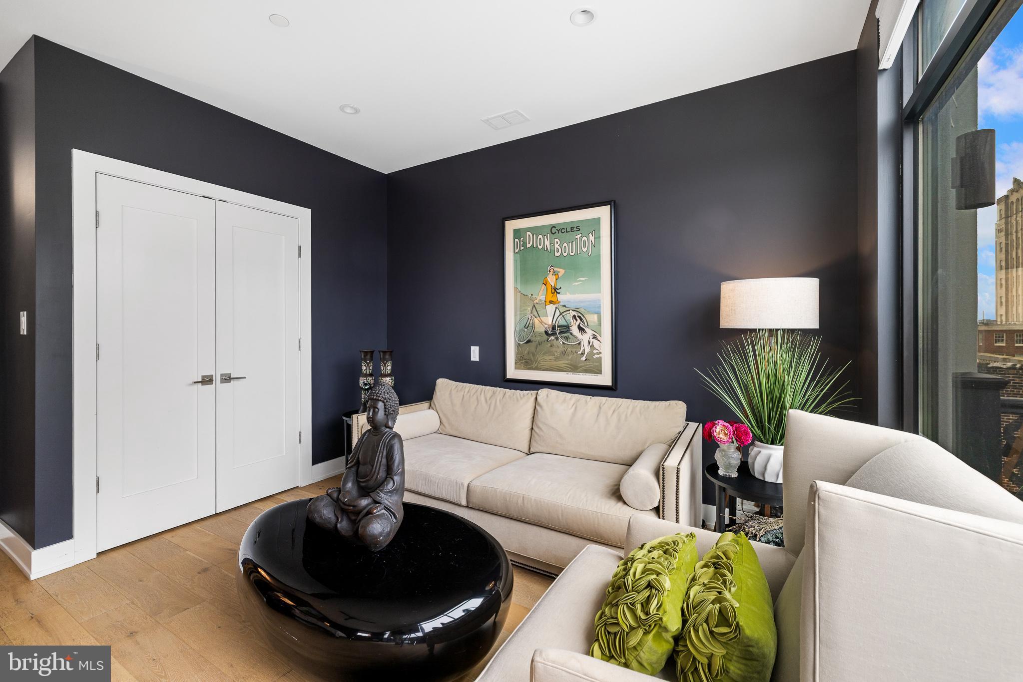 20 Letitia Street, Unit 5B Philadelphia, PA 19106 - Photo 23 of 44 a living room with furniture and a potted plant
