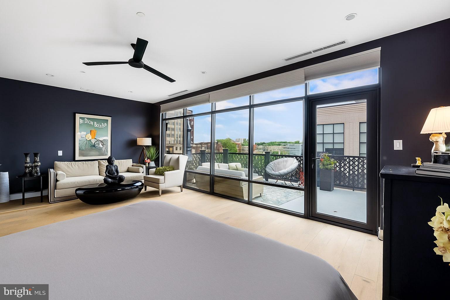 20 Letitia Street, Unit 5B Philadelphia, PA 19106 - Photo 25 of 44 a spacious bedroom with a bed and a large window