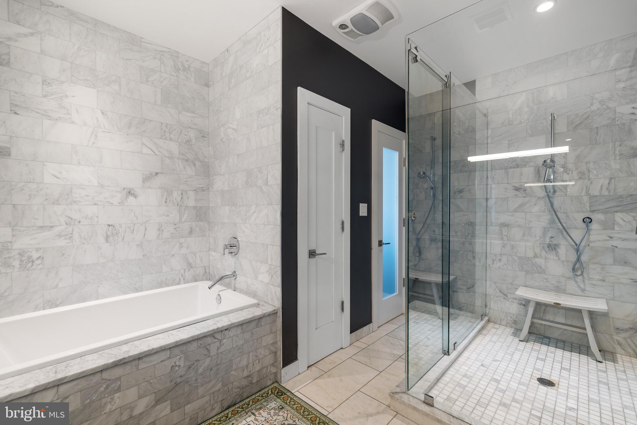 20 Letitia Street, Unit 5B Philadelphia, PA 19106 - Photo 28 of 44 a bathroom with a bathtub and shower