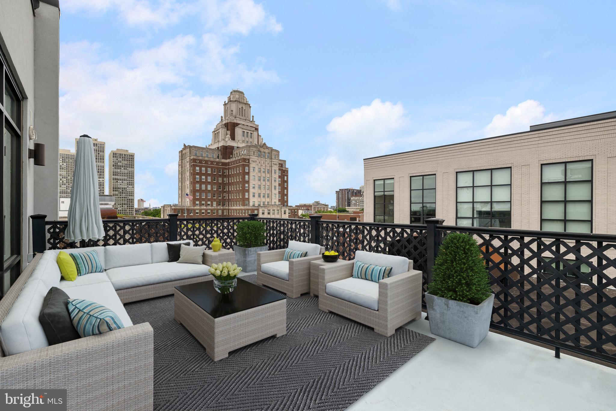 20 Letitia Street, Unit 5B Philadelphia, PA 19106 - Photo 31 of 44 a roof deck with couch and garden view
