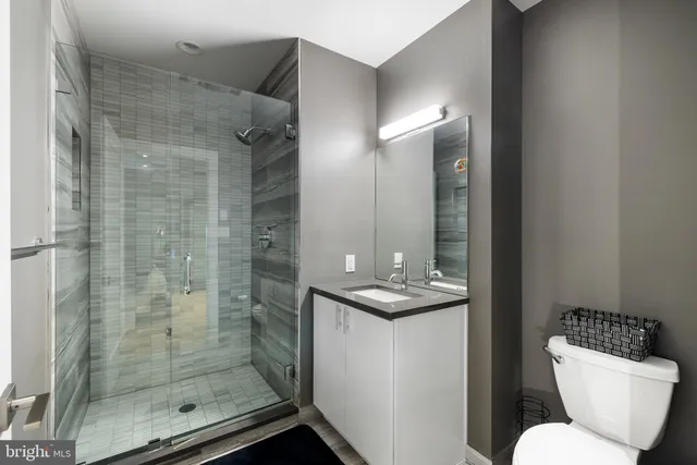 a bedroom with furniture and a bed