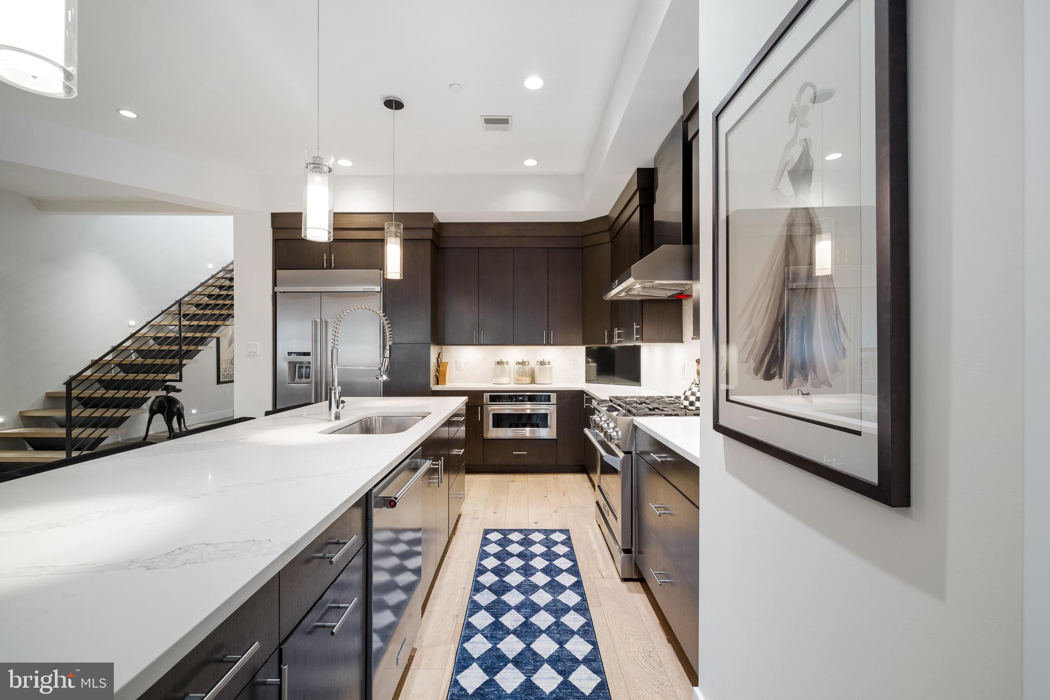 20 Letitia Street, Unit 5B Philadelphia, PA 19106 - Photo 5 of 44 a kitchen with lots of counter top space