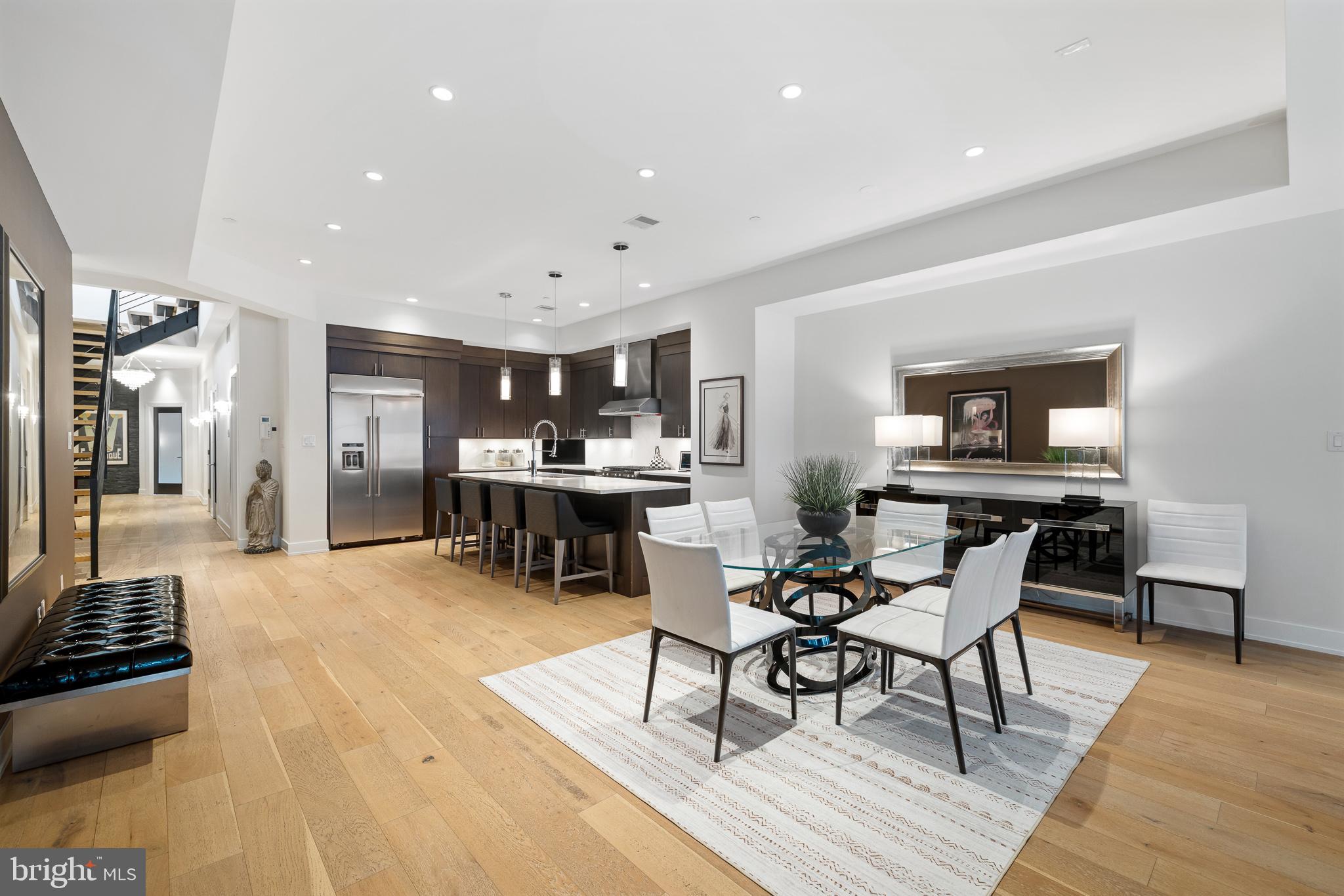 20 Letitia Street, Unit 5B Philadelphia, PA 19106 - Photo 9 of 44 a living room with furniture and kitchen view