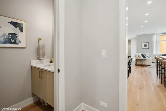 a view of a living room and bathroom
