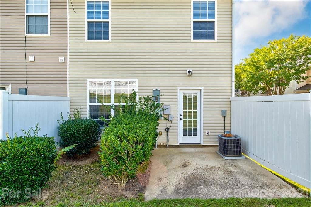 1310 Smokey Quartz Lane Fort Mill, SC 29708 - Photo 14 of 18 a view of a house with backyard and garden