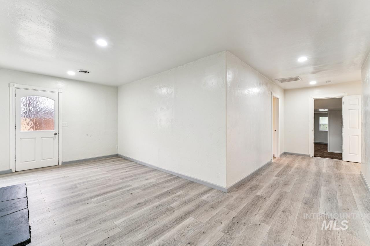 317 East Ithaca Street Caldwell, ID 83605 - Photo 21 of 49 Foyer featuring plenty of natural light and light wood-style flooring