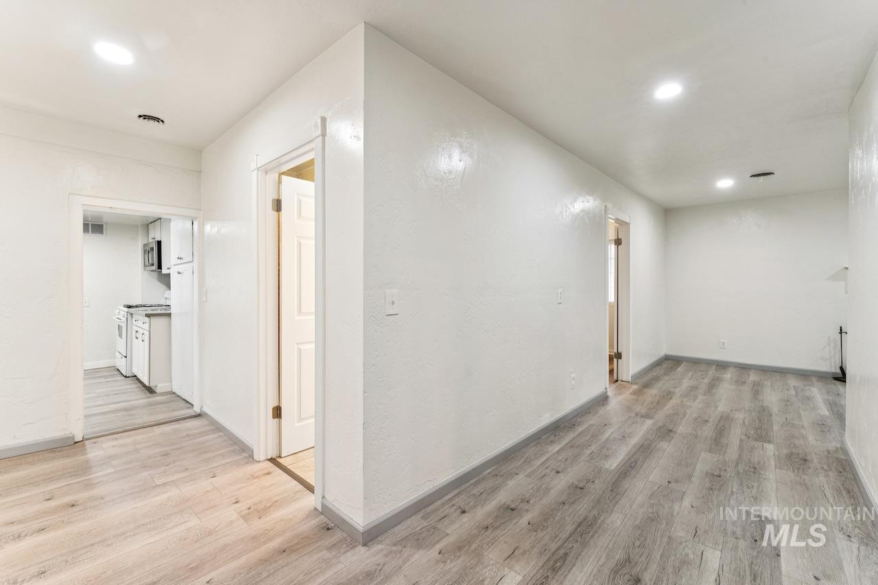 317 East Ithaca Street Caldwell, ID 83605 - Photo 32 of 49 Hallway featuring light wood finished floors and recessed lighting