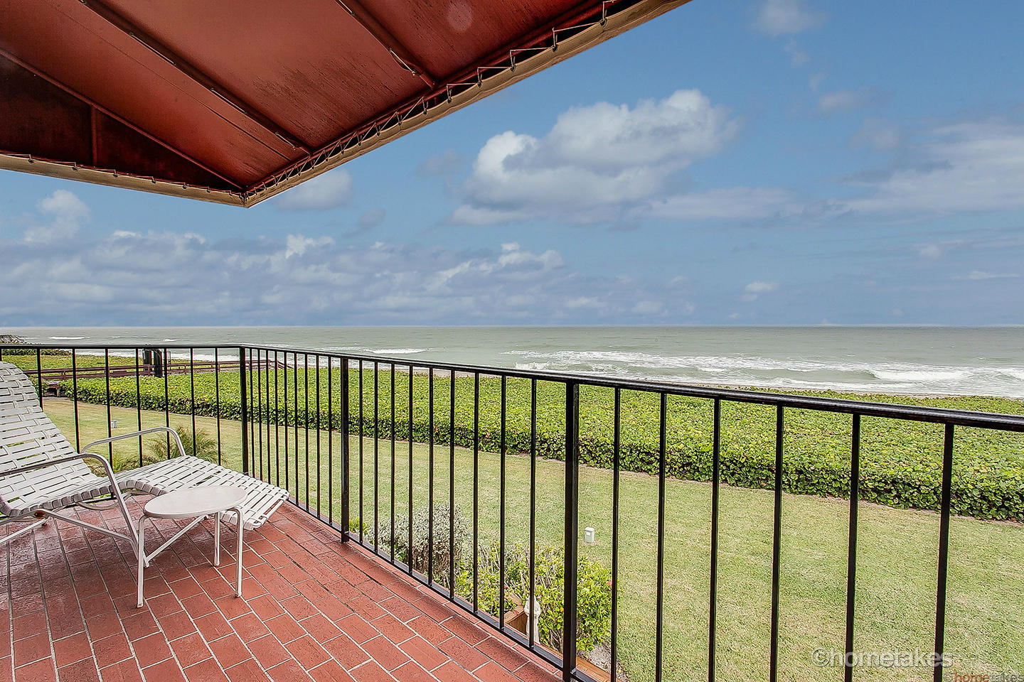 170 Celestial Way, Unit 46 Juno Beach, FL 33408 - Photo 17 of 33 a view of a balcony with a potted plant